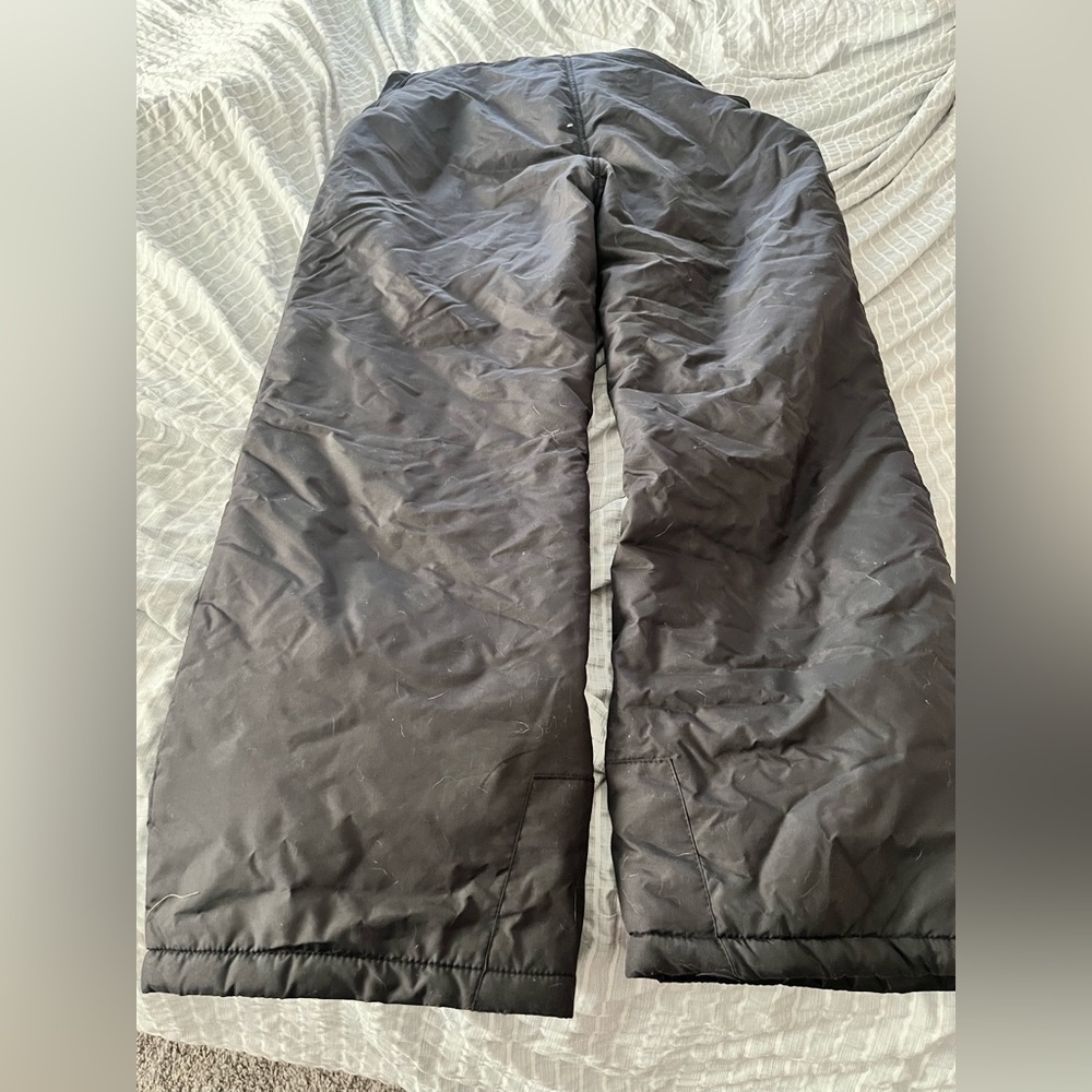 Women’s size large snow pants.